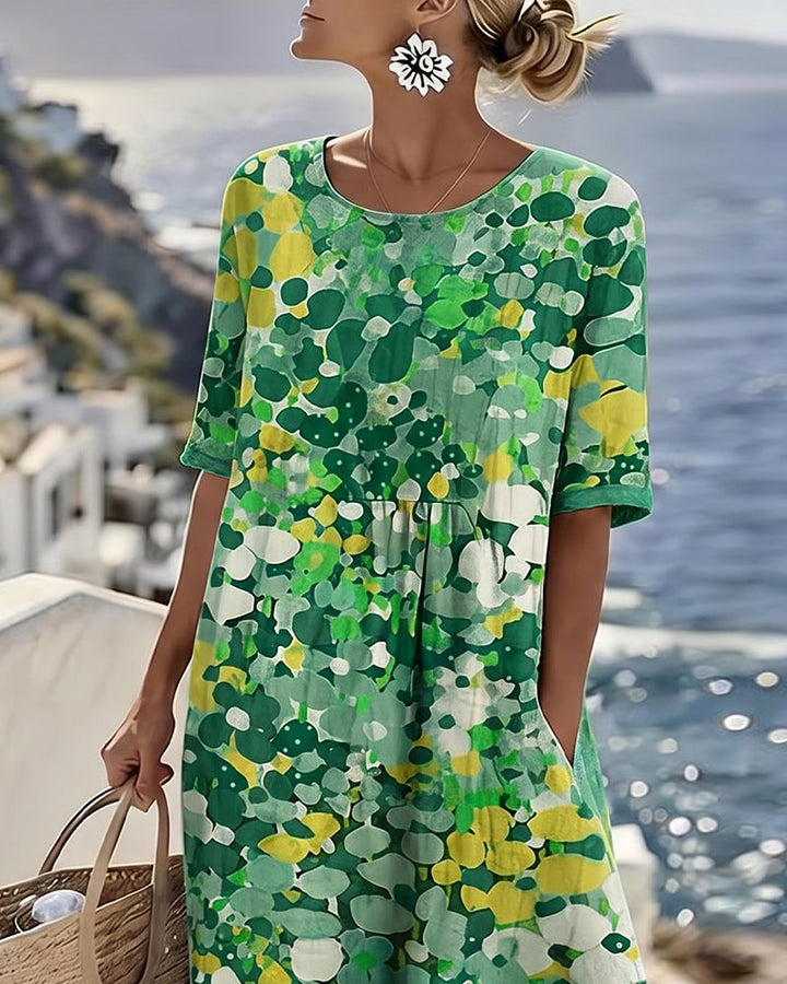 Elina Blumen-Midikleid in Grün – Rückansicht