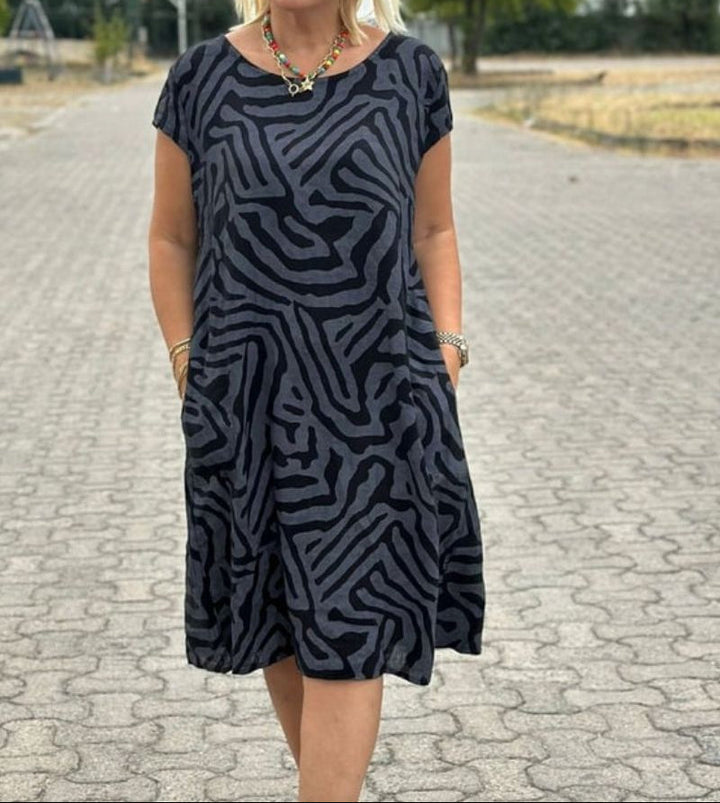 Solinaprint | Kleid mit Rundhalsausschnitt und Wunderschönem, Bauchbedeckendem Print