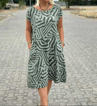 Solinaprint | Kleid mit Rundhalsausschnitt und Wunderschönem, Bauchbedeckendem Print