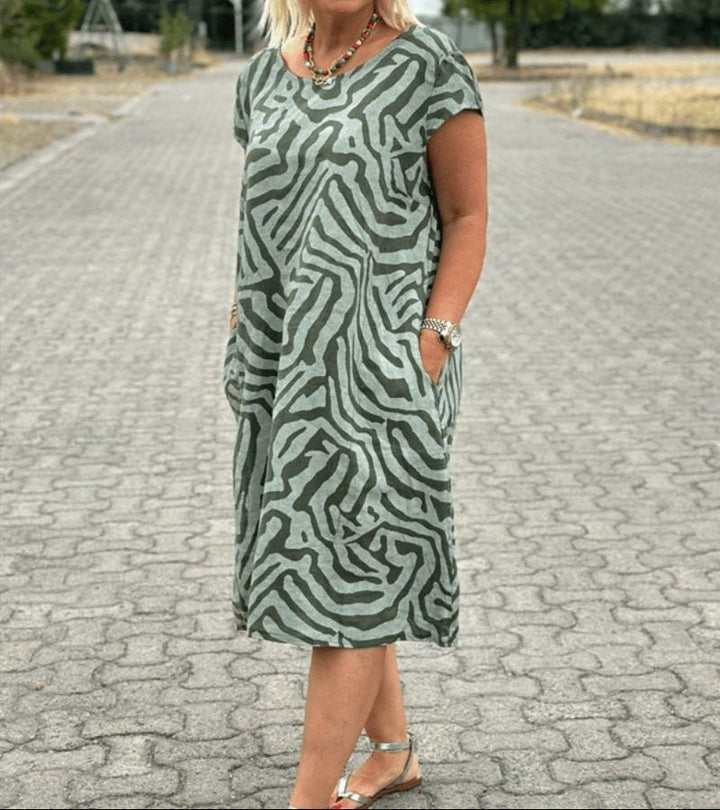 Solinaprint | Kleid mit Rundhalsausschnitt und Wunderschönem, Bauchbedeckendem Print