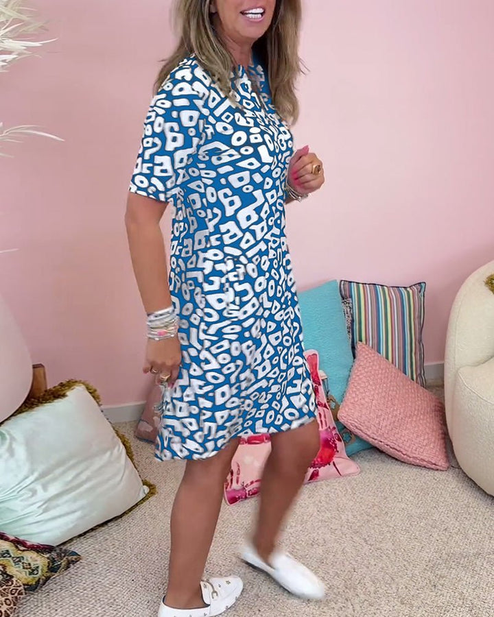 Musterzauber | Bedrucktes Kleid mit V-Ausschnitt und Taschen