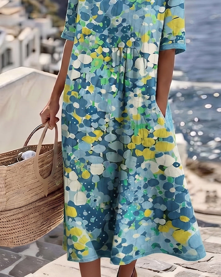 Elina Blumen-Midikleid in Blau – Seitenansicht