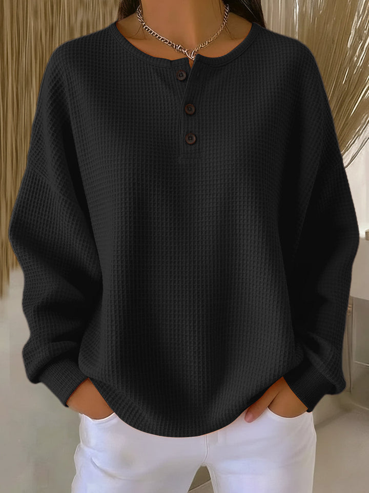 Mirabel Sweatshirt mit Henley-Ausschnitt in Schwarz