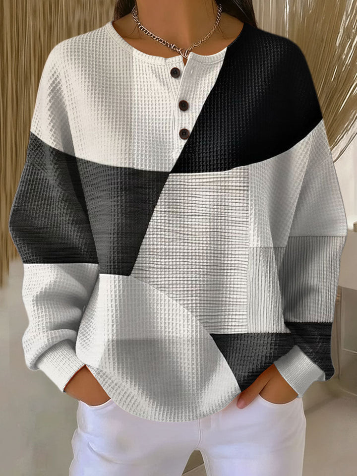 Ondine Pullover mit Henley-Ausschnitt, Geometrie-Muster in Schwarz-Weiß