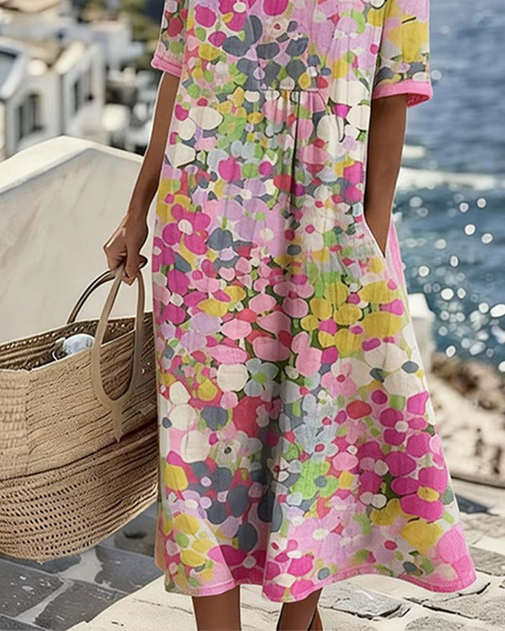 Elina Blumen-Midikleid in Rosa – Rückansicht