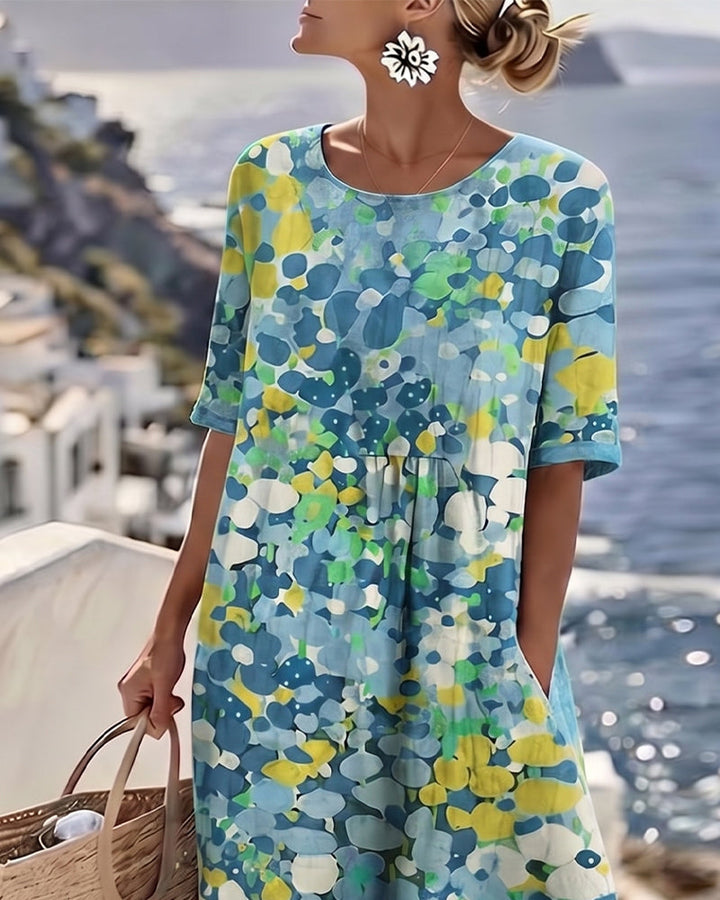 Elina Blumen-Midikleid in Blau – Rückansicht