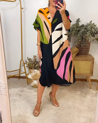 Leafaramuster | Lockeres Kleid mit farbenfrohem Blattmuster